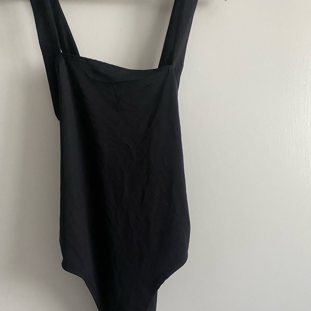 Forever 21 silky bodysuit size large with a cross back